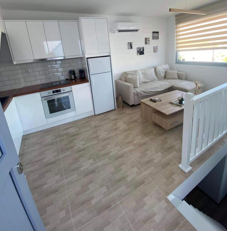 Kuchyň nebo kuchyňský kout v ubytování Cozy Residence