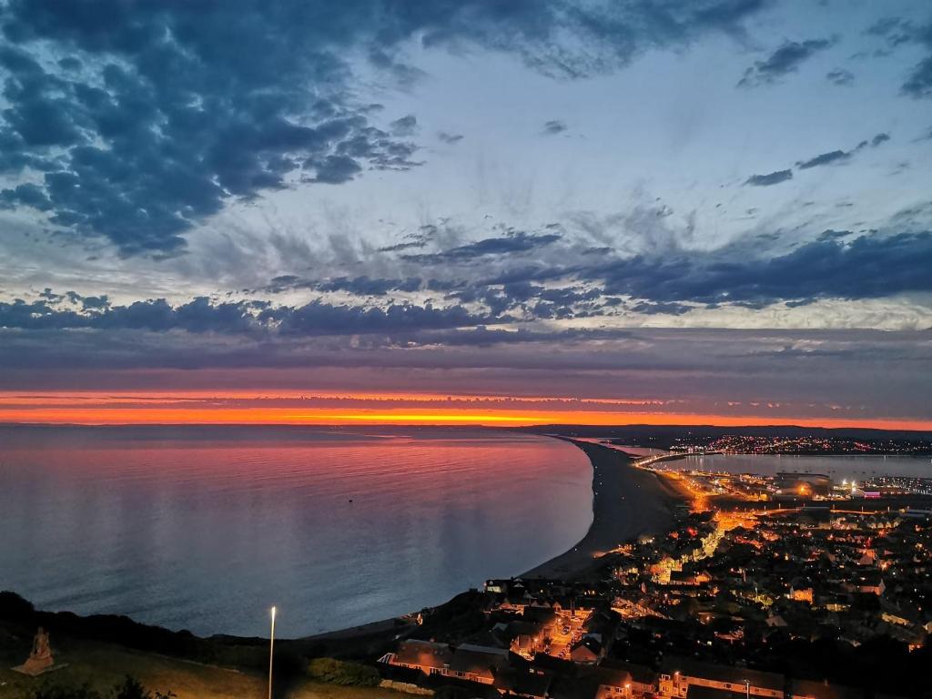 a view of the beach at sunset at Cuddy in Castletown