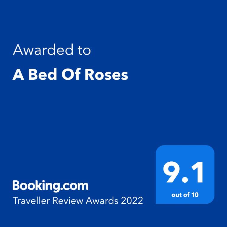 Postel nebo postele na pokoji v ubytování A Bed Of Roses