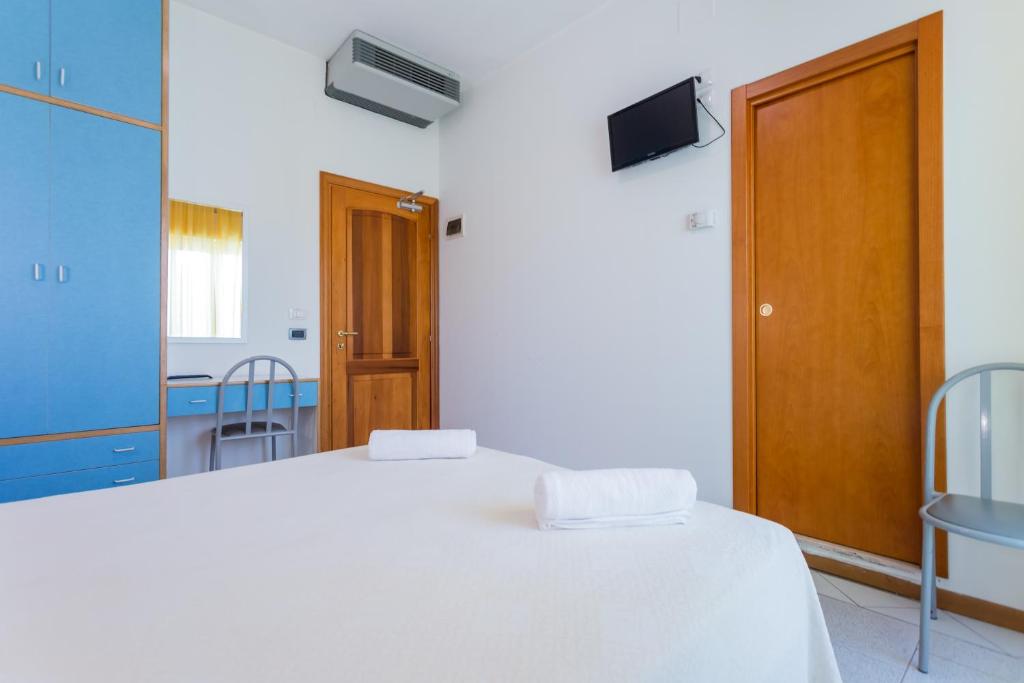 Postel nebo postele na pokoji v ubytování Hotel Plaza con piscina