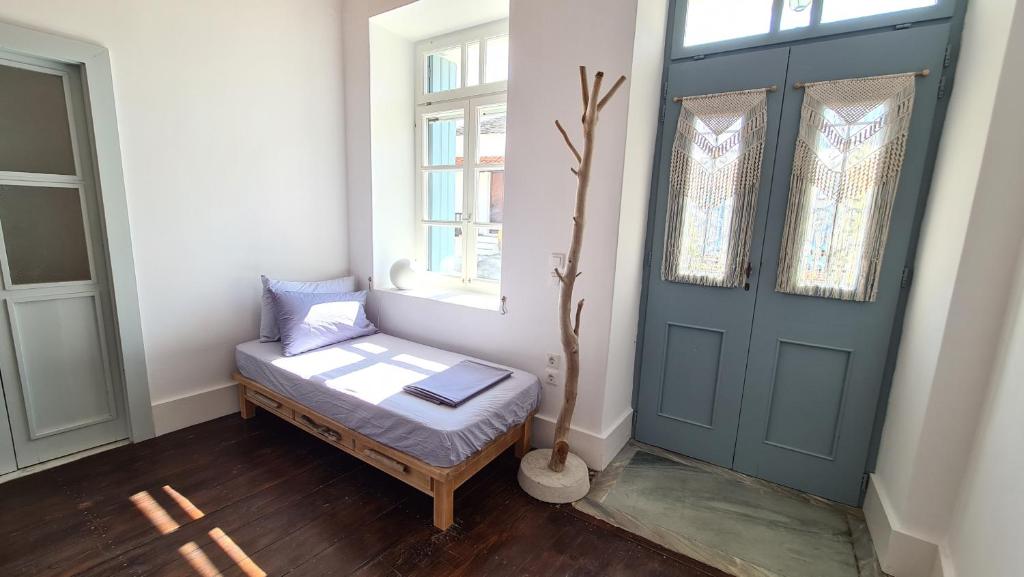 Postel nebo postele na pokoji v ubytování Townhouse Christos