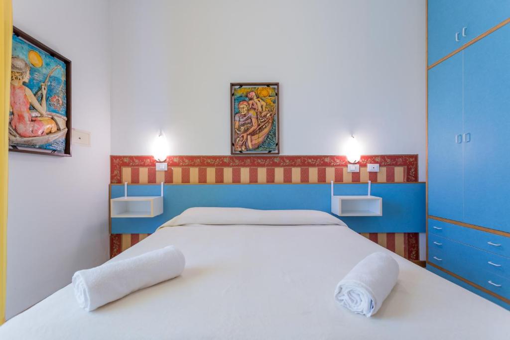 Postel nebo postele na pokoji v ubytování Hotel Plaza con piscina