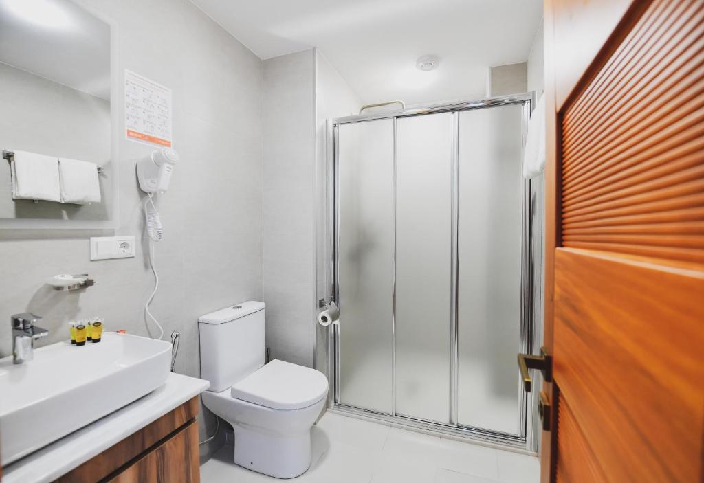 Koupelna v ubytování Address Boutique Hotel