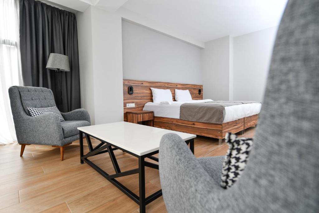 Postel nebo postele na pokoji v ubytování Address Boutique Hotel