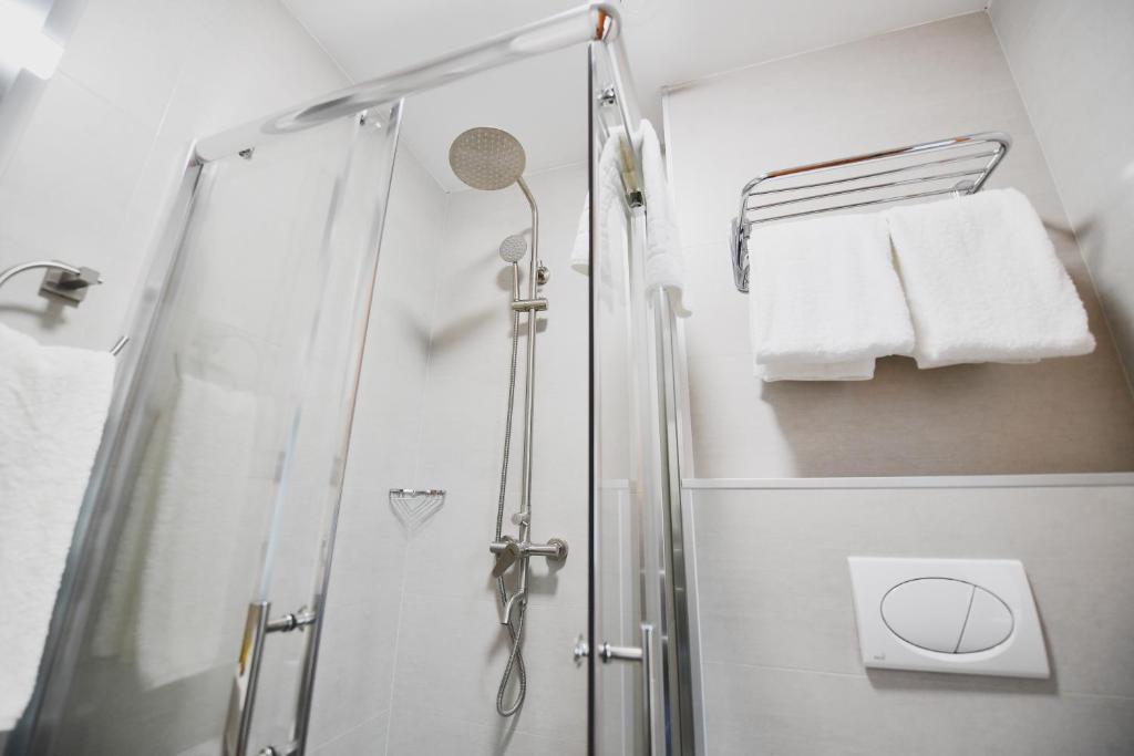 Koupelna v ubytování Address Boutique Hotel