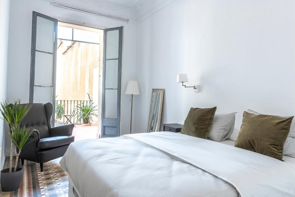 Postel nebo postele na pokoji v ubytování B-Garden BCN