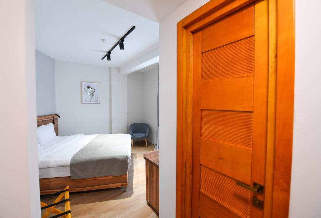 Postel nebo postele na pokoji v ubytování Address Boutique Hotel