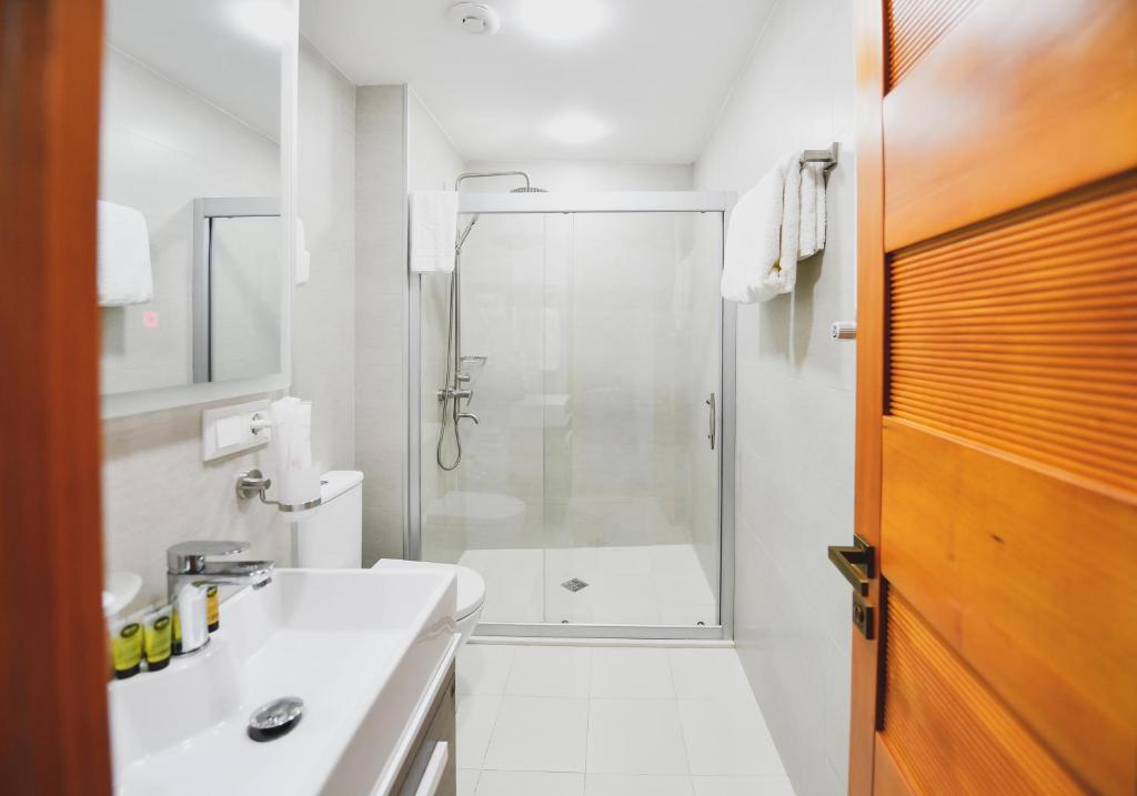 Koupelna v ubytování Address Boutique Hotel