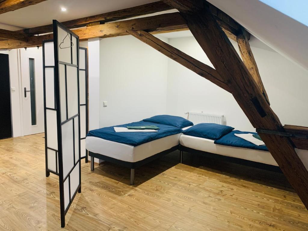 Postel nebo postele na pokoji v ubytování Studio-Apartments Boulevard