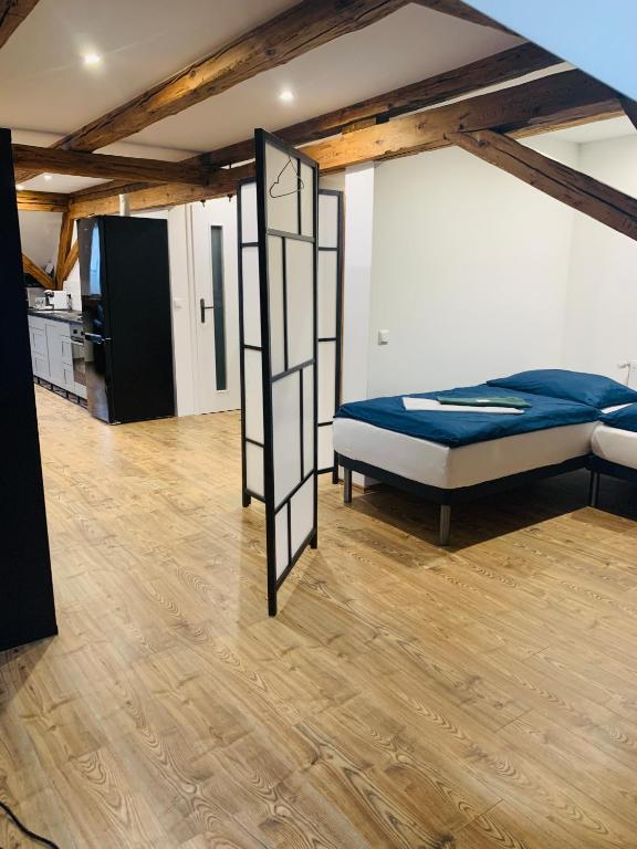 Postel nebo postele na pokoji v ubytování Studio-Apartments Boulevard