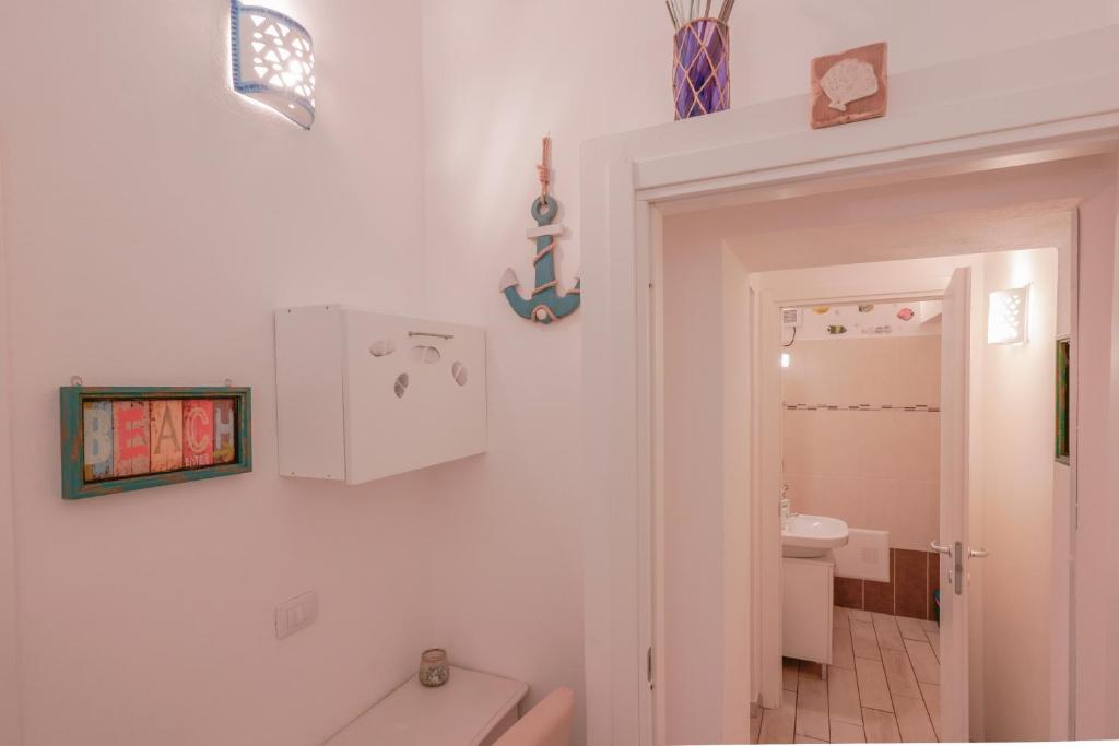 Kúpeľňa v ubytovaní Approdo Rooms - Eja Sardinia