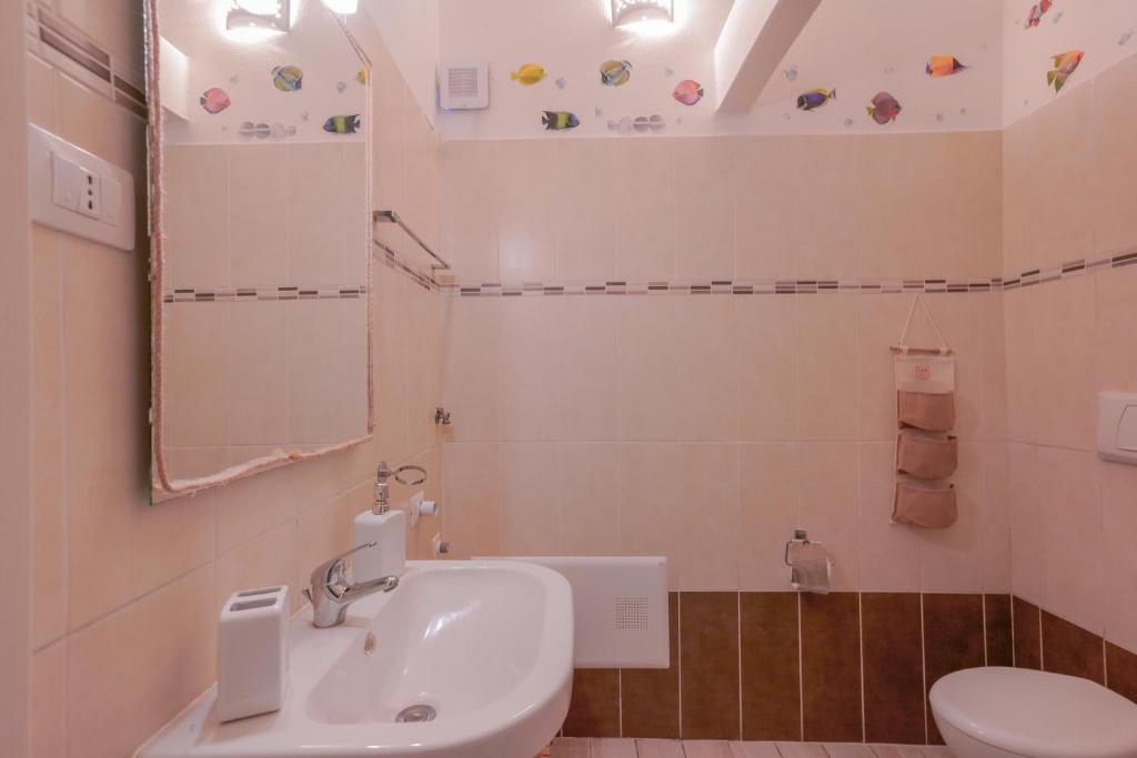 Kúpeľňa v ubytovaní Approdo Rooms - Eja Sardinia