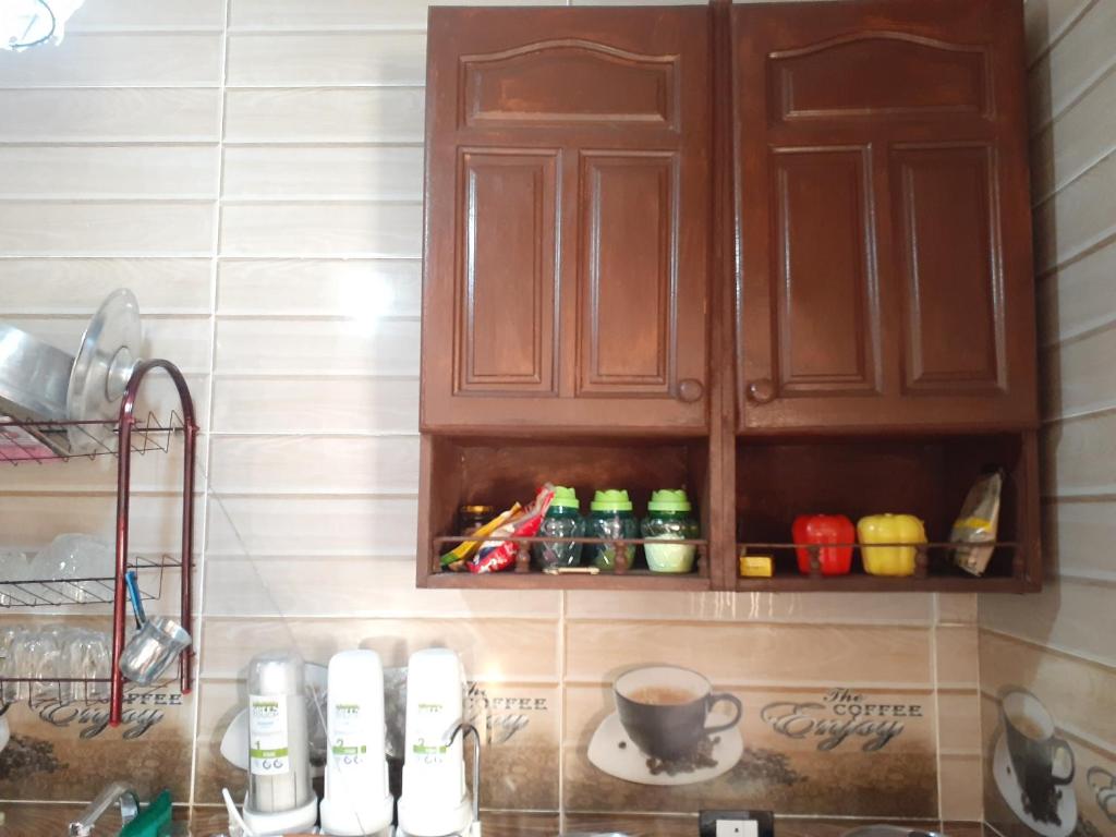 A kitchen or kitchenette at Free Wi-Fi شقة فندقية فى الاسكندرية New apartment sea view Alexandria