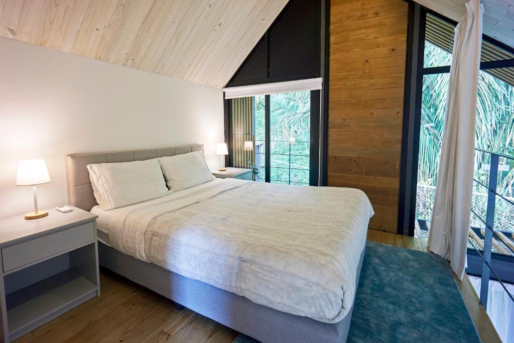 Giường trong phòng chung tại Casa Nova