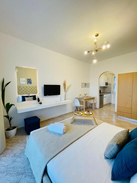 Postel nebo postele na pokoji v ubytování Althea Apartments