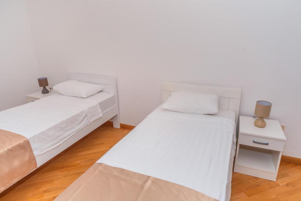 Postel nebo postele na pokoji v ubytování Alex Lux sea view aparmtent 2