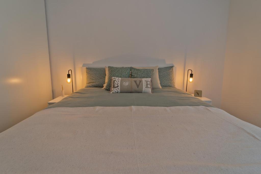 Łóżko lub łóżka w pokoju w obiekcie MaLeMi apartment