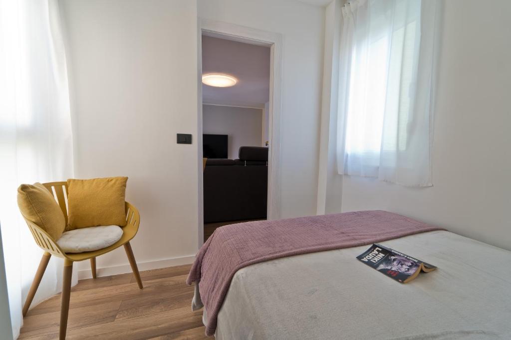 Łóżko lub łóżka w pokoju w obiekcie MaLeMi apartment