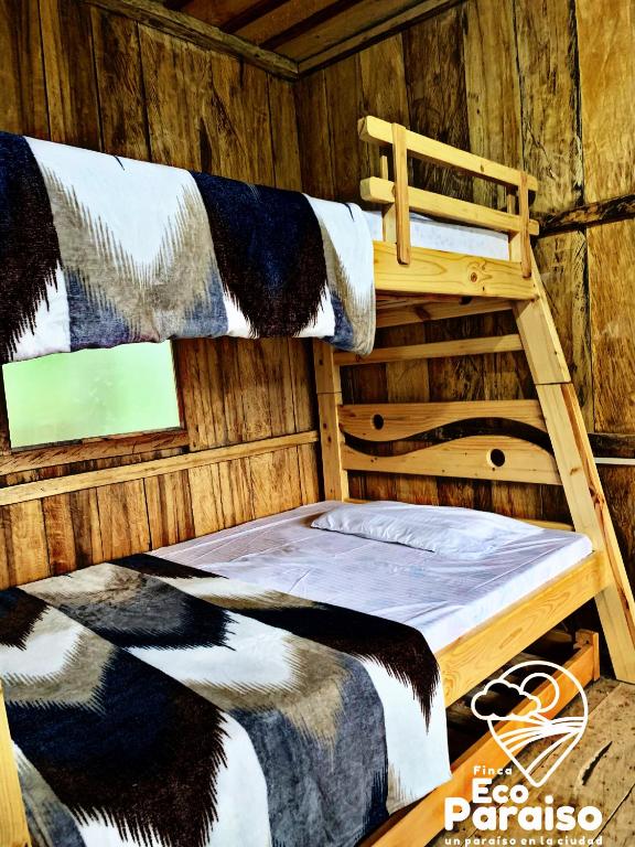 Postel nebo postele na pokoji v ubytování Finca Ecoparaiso