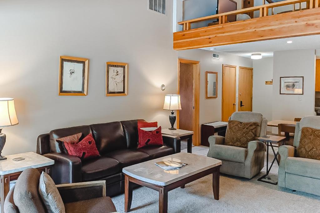 a living room with a couch and chairs at White Ridge A3 in Teton Village