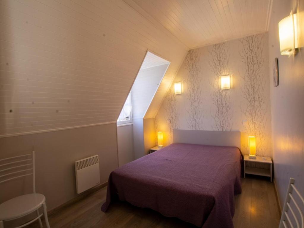 a small bedroom with a bed and a window at Gîte Domme, 5 pièces, 8 personnes - FR-1-616-23 in Domme