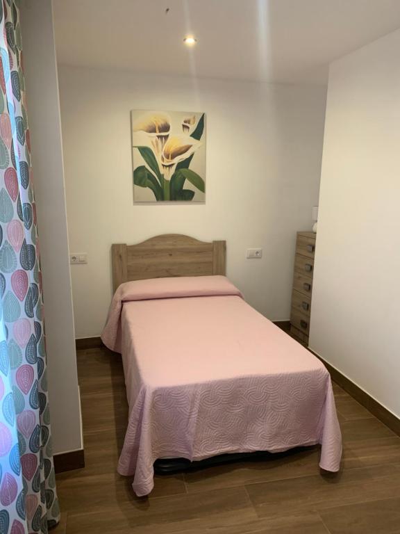 Łóżko lub łóżka w pokoju w obiekcie Alojamiento Rural Cortijo Alameda, Las Lagunillas