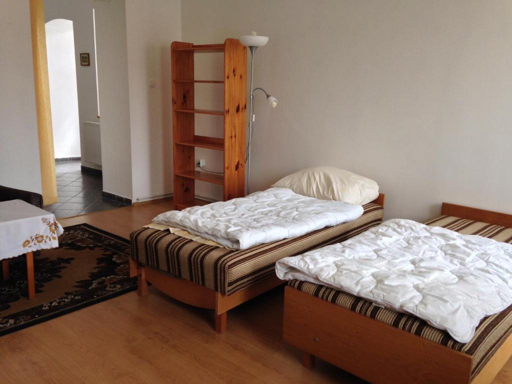Posteľ alebo postele v izbe v ubytovaní Petra Apartmanok