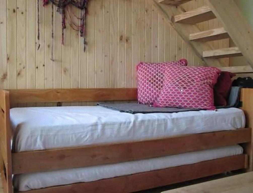 Cama ou camas em um quarto em Magma Lodge, Pucon