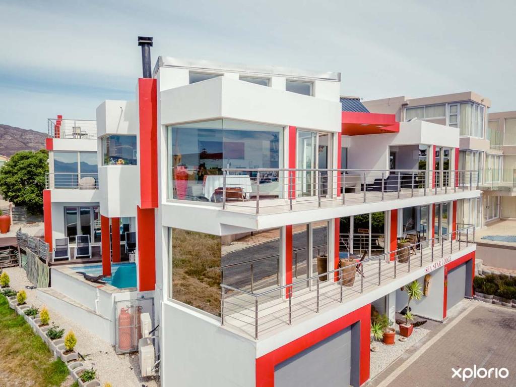 an aerial view of a house with red and white at Sea Star Lodge in Gansbaai