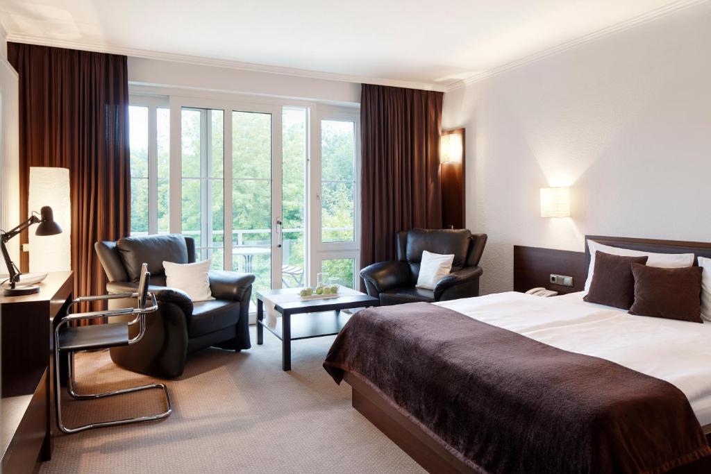 Postel nebo postele na pokoji v ubytování nordica Hotel Berlin