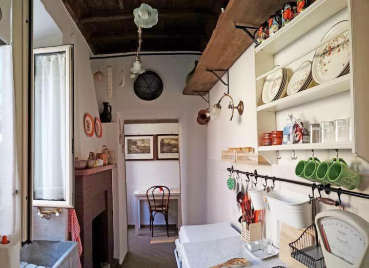 Kuchyň nebo kuchyňský kout v ubytování BIANCOFIORE Alloggio Turistico
