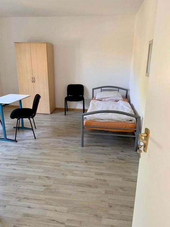 Postel nebo postele na pokoji v ubytování Neureut