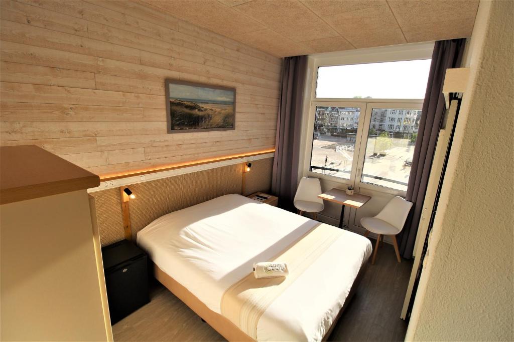 Cama o camas de una habitación en Hotel Cecil