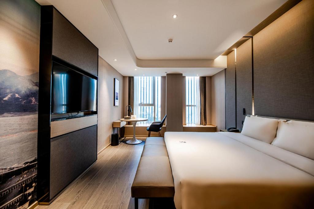 TV a/nebo společenská místnost v ubytování Atour S Hotel Shenzhen Longgang Zhonghaixing