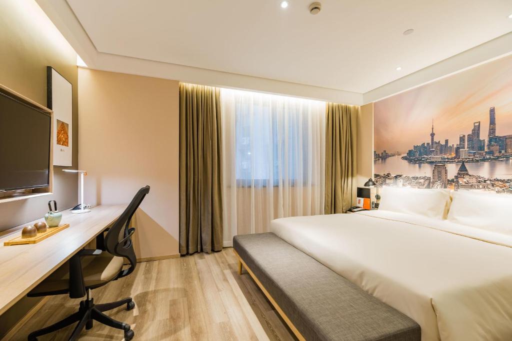 Postel nebo postele na pokoji v ubytování Atour Hotel Shanghai The Old Bund Pier