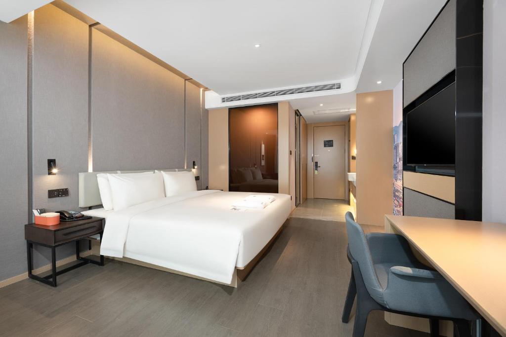 Postel nebo postele na pokoji v ubytování Atour Hotel Xian Software Park High-Tech 3rd Road