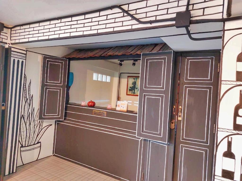 RoomQuest Chiang Mai Tha Phae - Resim 9