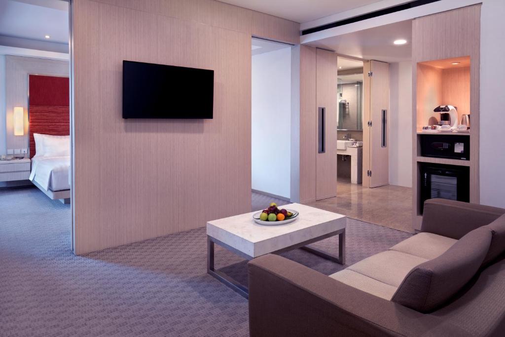 TV a/nebo společenská místnost v ubytování Grand Mercure Jakarta Harmoni