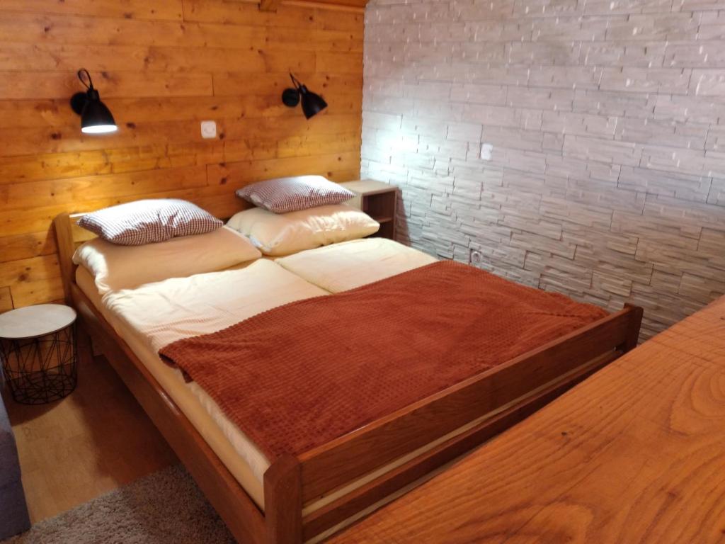 Postel nebo postele na pokoji v ubytování Apartments Kristic