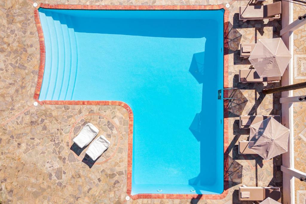 Bazén v ubytování Princess Tia Hotel nebo v jeho okolí