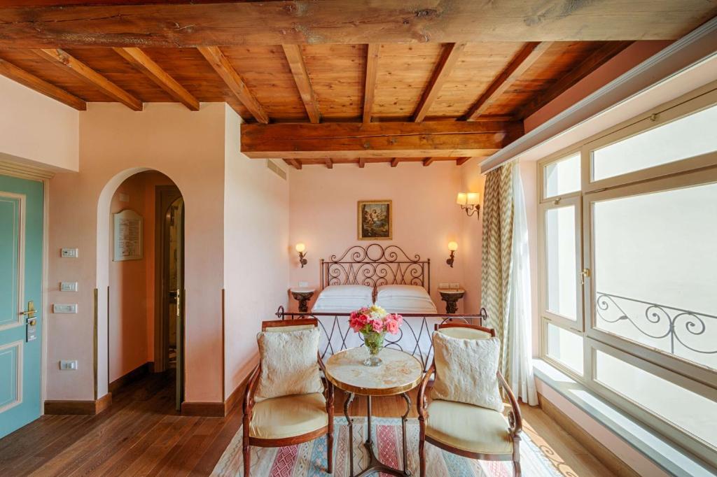 Posezení v ubytování Hotel Mulino di Firenze - WorldHotels Crafted