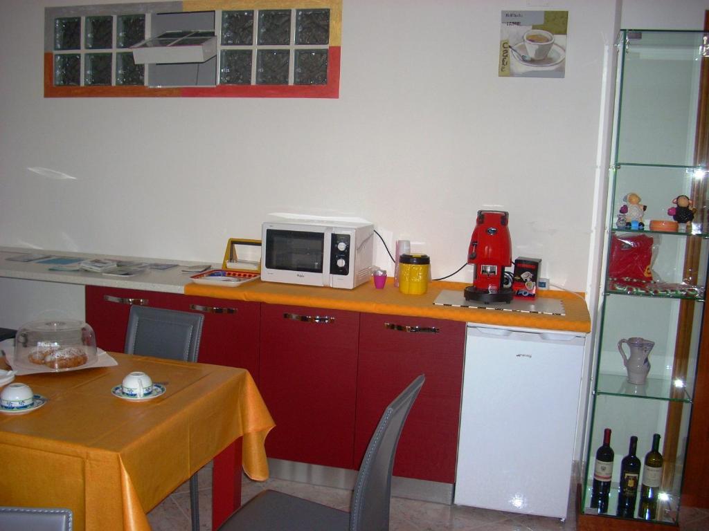 Kuchyň nebo kuchyňský kout v ubytování Lucantò Accommodations
