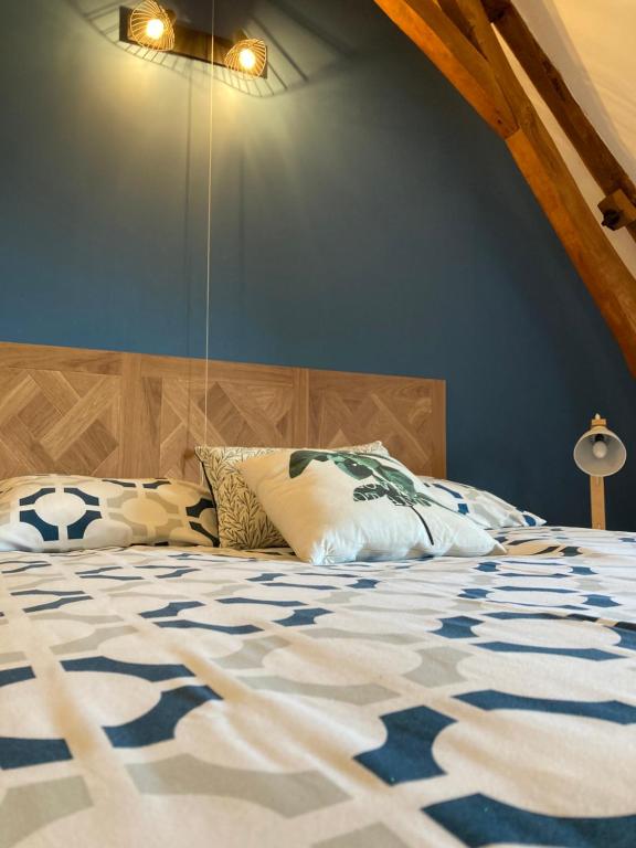 Postel nebo postele na pokoji v ubytování Chambres dhotes a la ferme