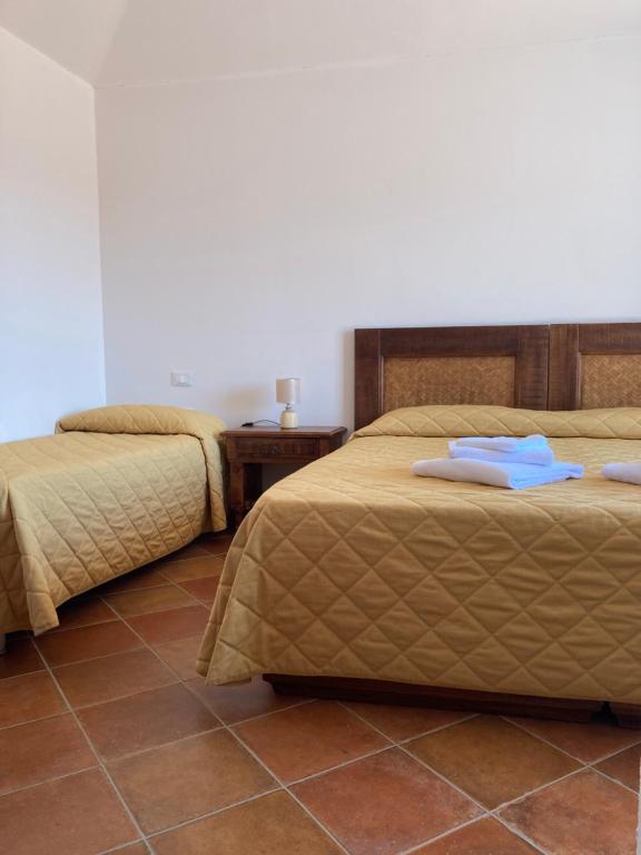 Postel nebo postele na pokoji v ubytování Hotel Funtana Ena