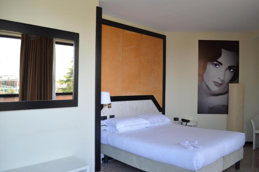 Postel nebo postele na pokoji v ubytování Hotel Diamante
