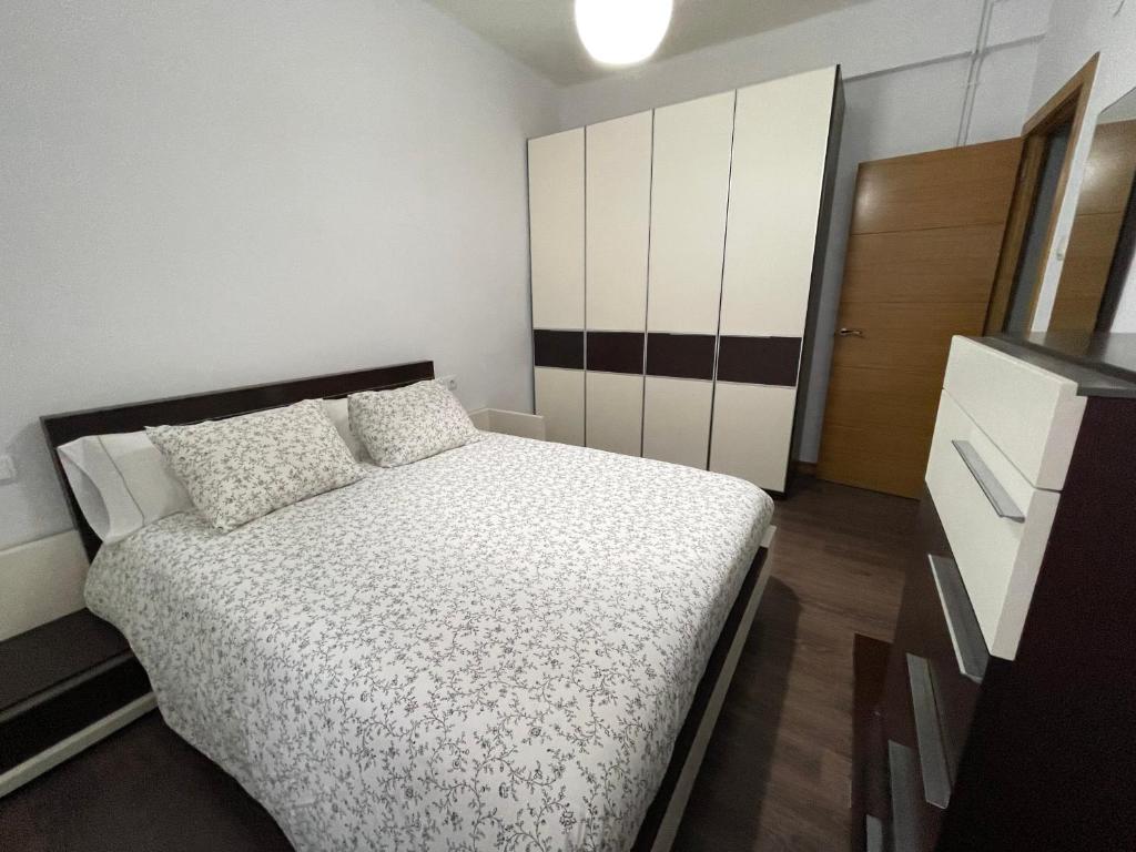 Postel nebo postele na pokoji v ubytování Uribarri Home Bilbao