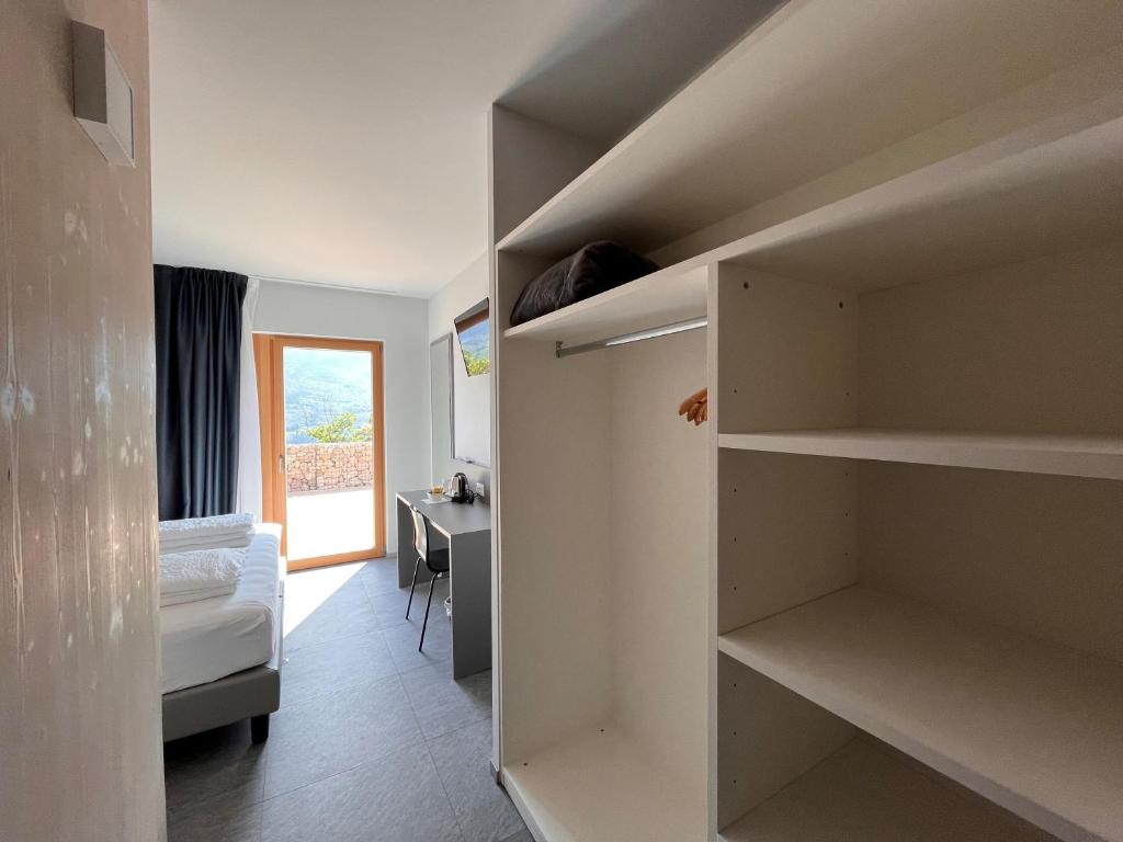 A bed or beds in a room at Agriturismo Margone