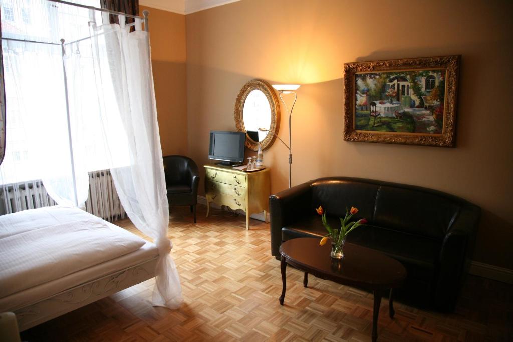 Posezení v ubytování Hotel-Maison Am Olivaer Platz