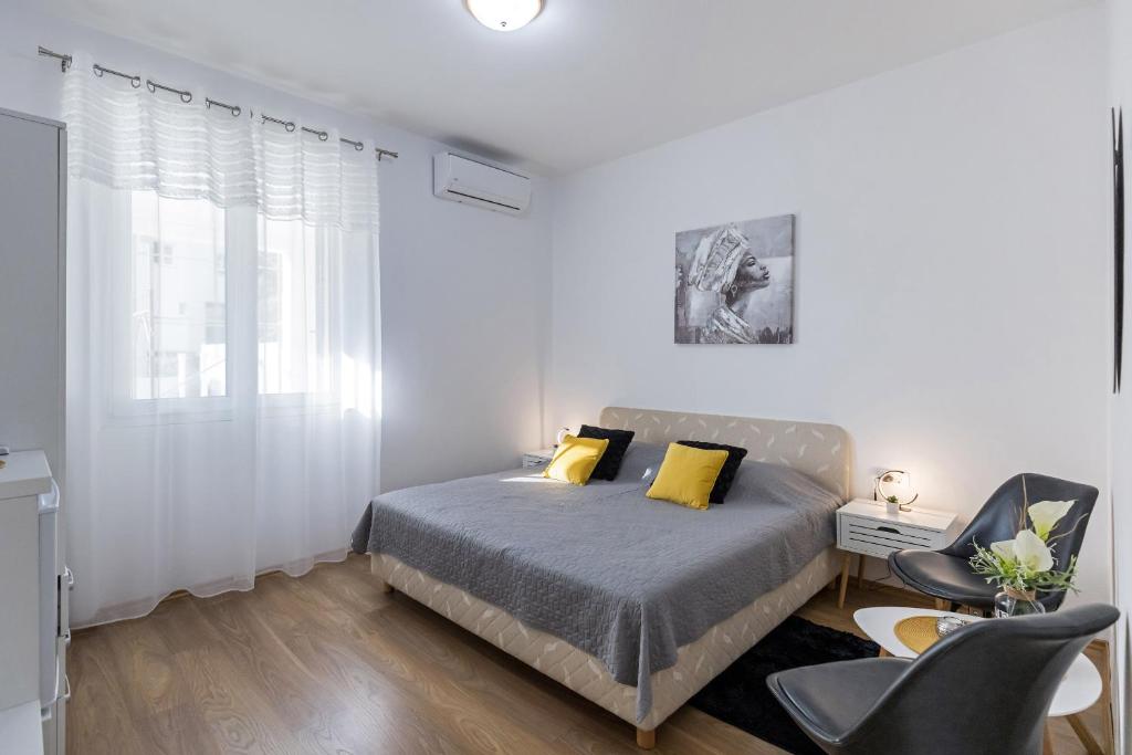 Posteľ alebo postele v izbe v ubytovaní Guest House Anna