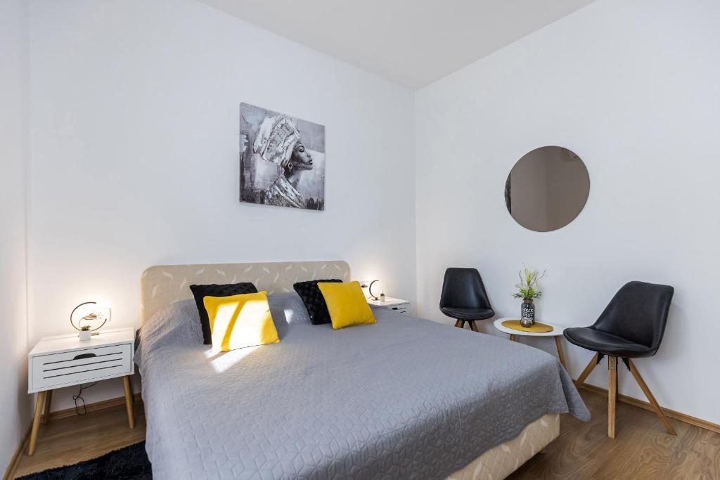 Posteľ alebo postele v izbe v ubytovaní Guest House Anna